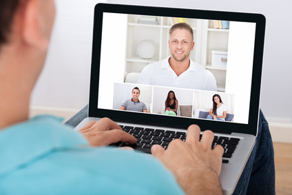 Man Having Video Conference With Friends